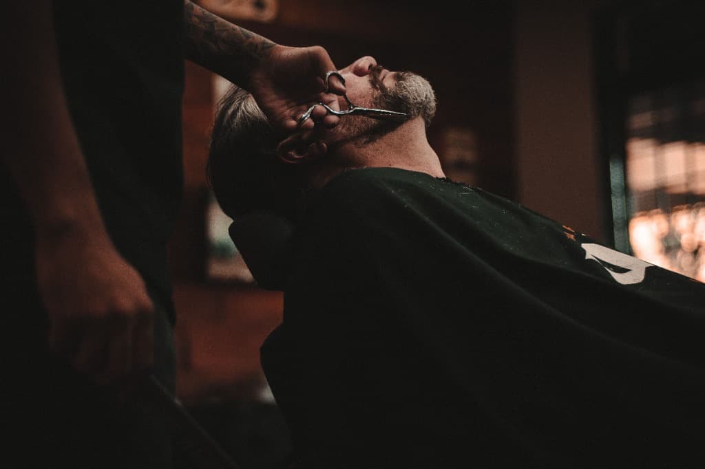 Barber cutting hair